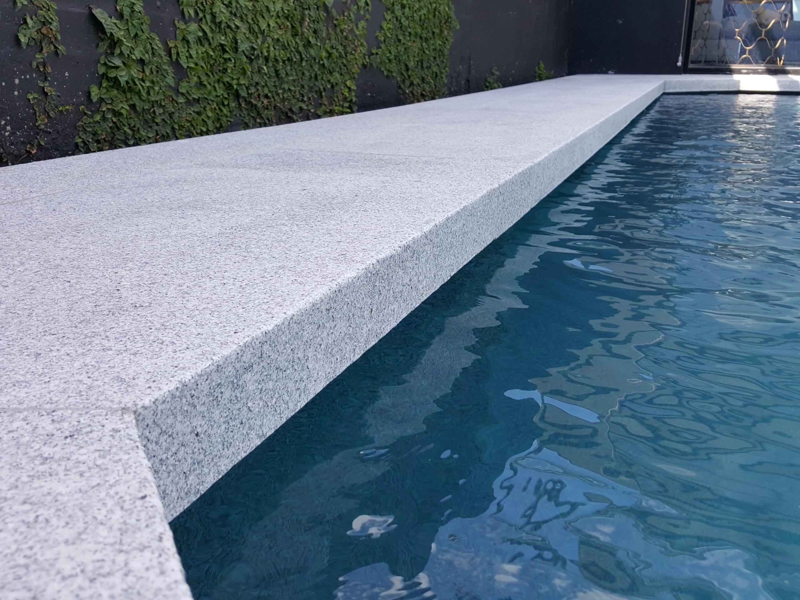 OPAL WHITE FLAMED GRANITE_RMS TRADERS_NATURAL STONE WHITE PAVERS POOL COPING SUPPLIER MELBOURNE 6