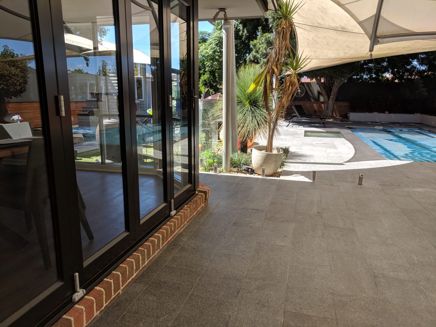 Black-pearl-granite_rms-traders-black-tiles-and-pavers-for-outdoor-use-1-scaled