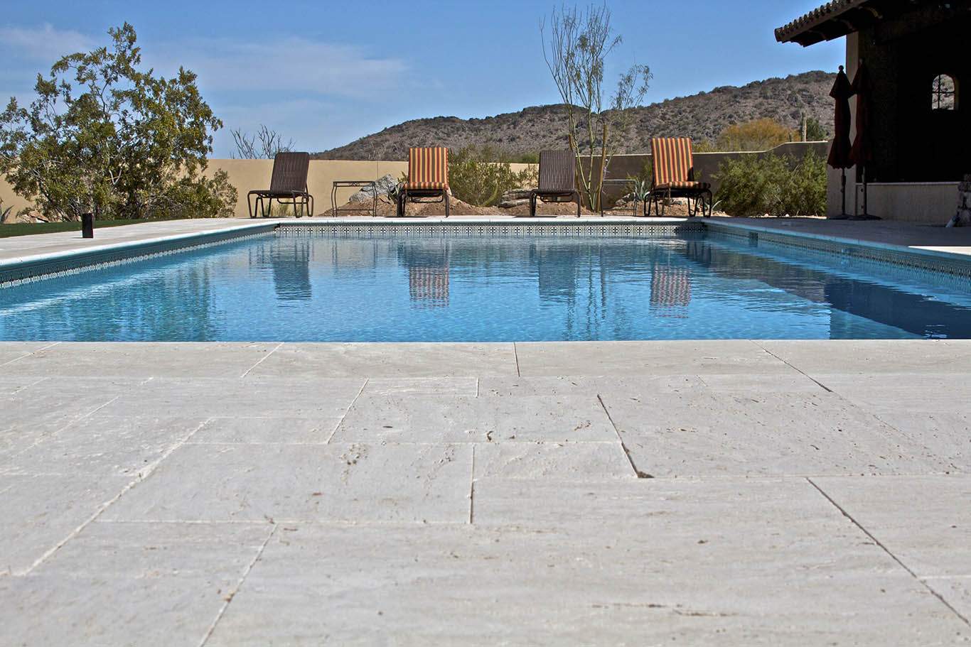 tuscan-rustic-unfilled-tumbled-travertine-pool-tiles-pavers-french-pattern